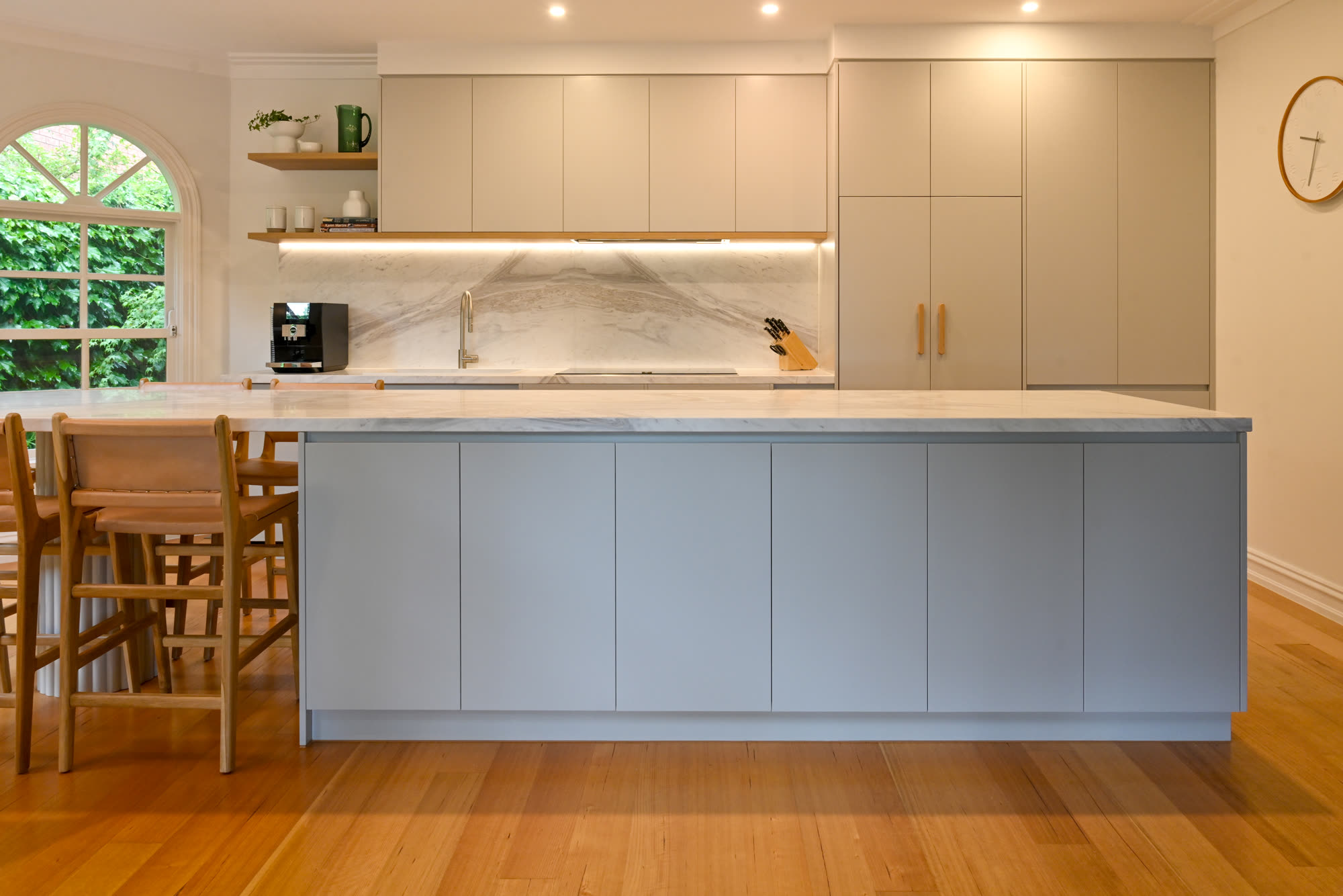 Custom blue island kitchen with marble waterfall benchtop built by PMD Projects